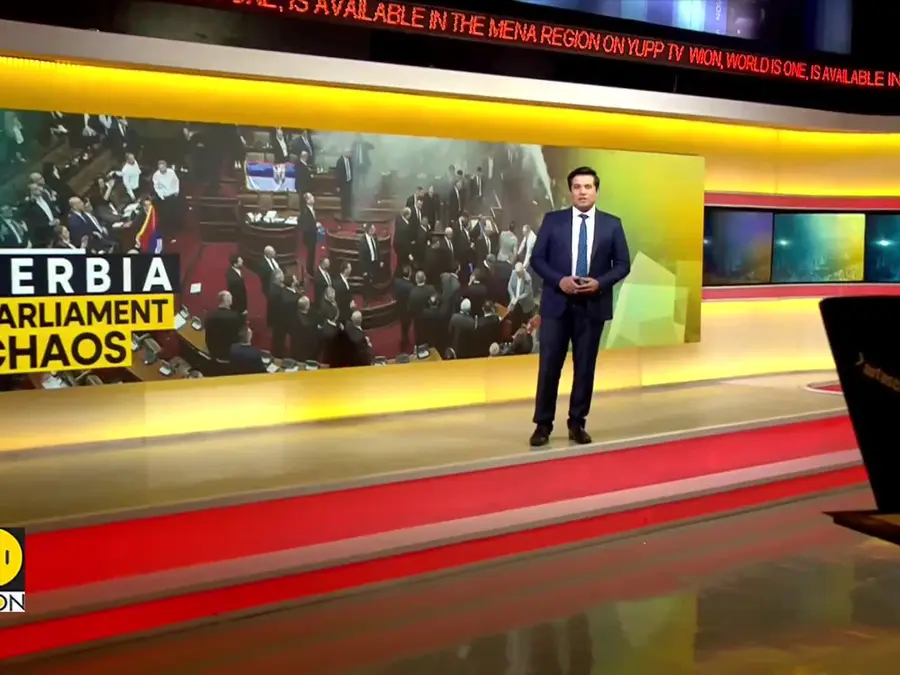 Chaos in Serbian parliament: Opposition MPs hurl smoke grenades, set off flares