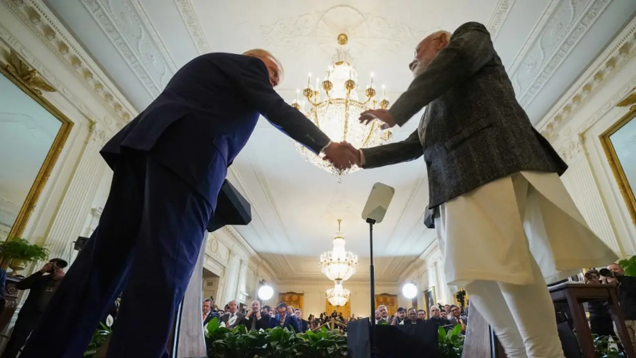 Trump welcomes Modi with a bear hug and a warning: 'Whatever tariffs India charges, we charge them' Trump welcomes Modi with a bear hug and a warning: 'Whatever tariffs India charges, we charge them'