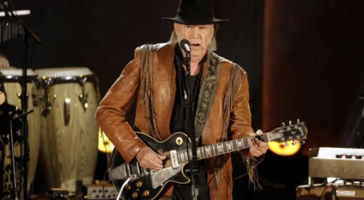 Neil Young will play Glastonbury; says 'error in information' caused news of pulling out Neil Young will play Glastonbury; says 'error in information' caused news of pulling out