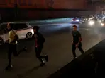 Dozens arrested, three hurt by car in Paris after PSG beat Arsenal in Champions League