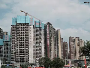 China's regulators vow to stabilise property, stock markets
