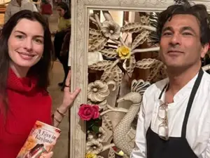 Hollywood actress Anne Hathaway visits chef Vikas Khanna's NY restaurant | In pics