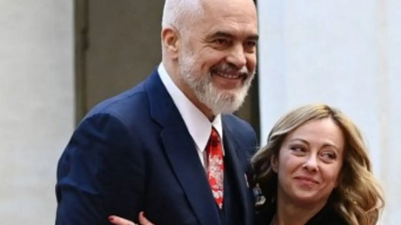 WATCH | Albanian PM goes down on one knee, surprises Giorgia Meloni with scarf on birthday WATCH | Albanian PM goes down on one knee, surprises Giorgia Meloni with scarf on birthday