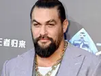 Jason Momoa rides his new Minecraft-inspired bike and shares he has wrapped Supergirl: Woman of Tomorrow