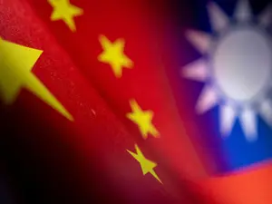 China sanctions seven military firms over US aid to Taiwan