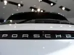 Porsche slashes outlook as US tariffs and China weakness bite