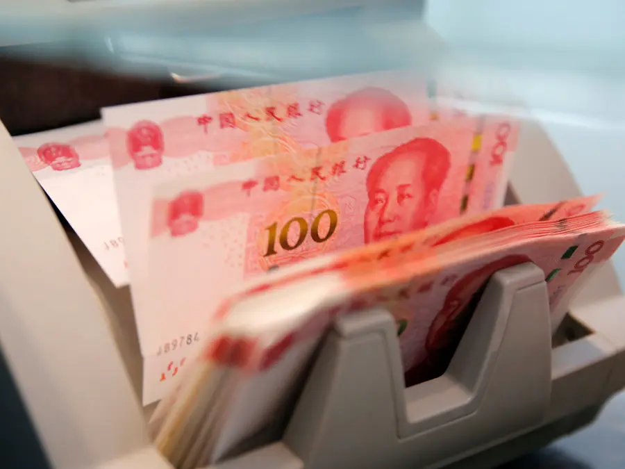 China's record capital outflows pile pressure on yuan