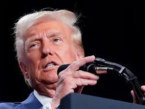 US Justice Department drops charges against Trump's co-defendants in record case