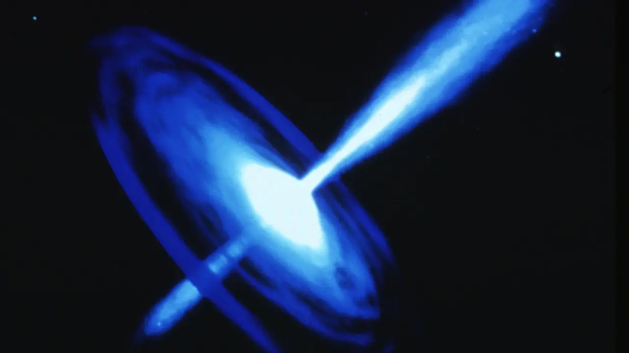 Supermassive black hole 12,500,000,000 light-years away is shooting jets towards Earth. What does it mean? Supermassive black hole 12,500,000,000 light-years away is shooting jets towards Earth. What does it mean?