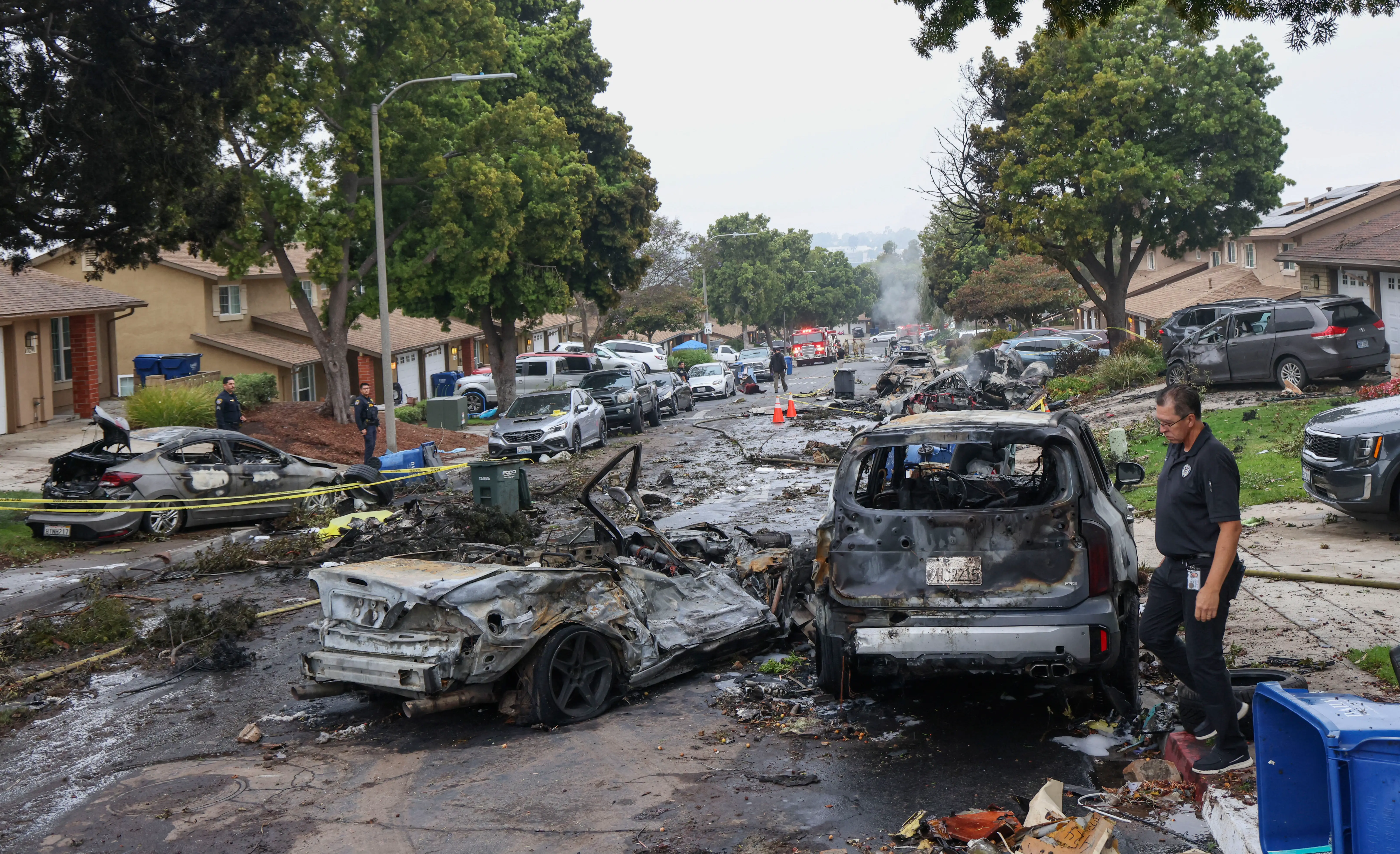 Several feared dead after small plane crashes into San Diego neighbourhood, homes & cars on fire