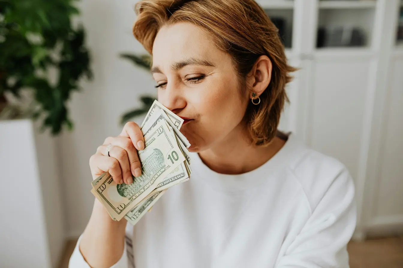 Your good looks help enhance your income—unless you’re also very smart, says study