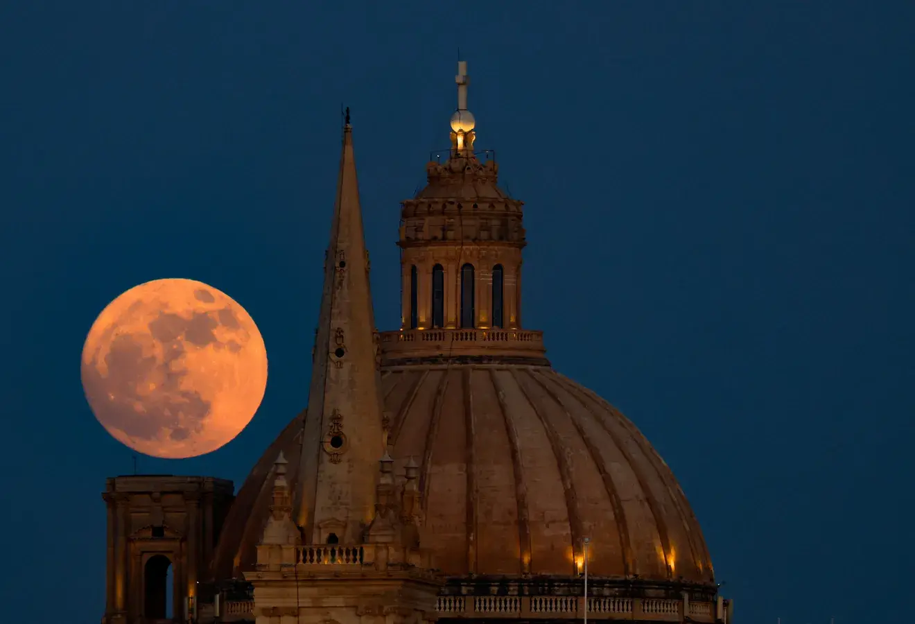 Strawberry Moon lights up the sky - Stunning images from across the world