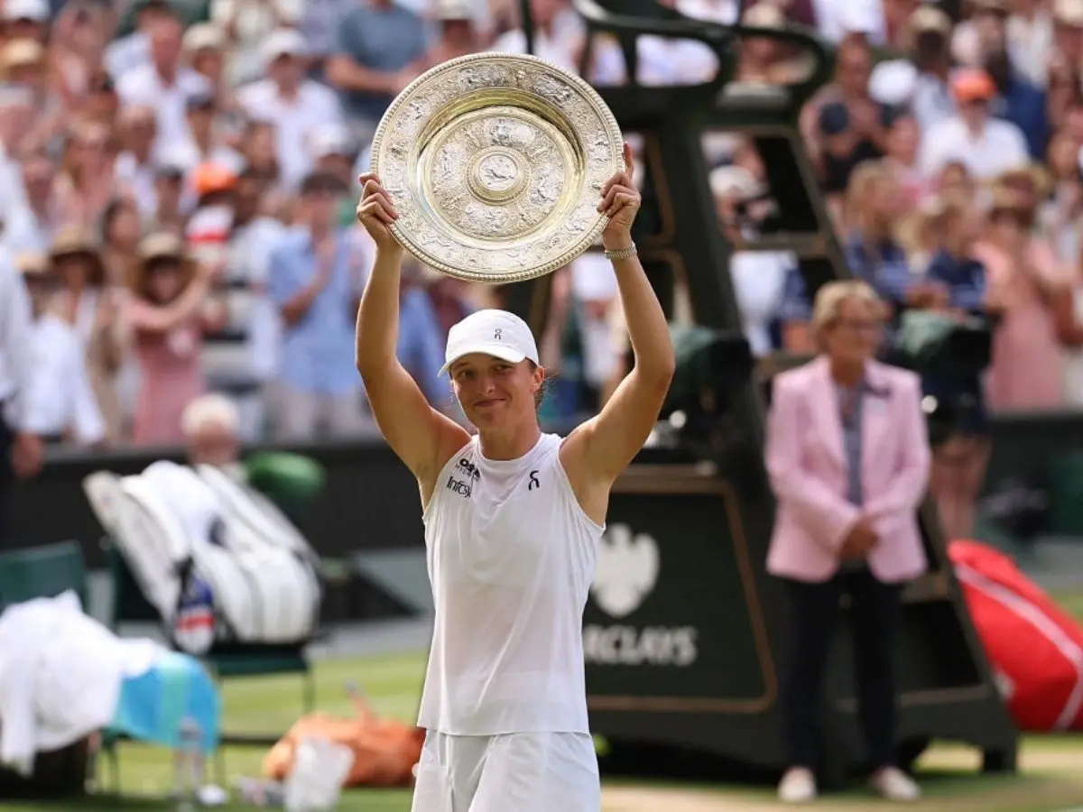 Iga Swiatek claims maiden Wimbledon title in historic win over American Anisimova Iga Swiatek claims maiden Wimbledon title in historic win over American Anisimova