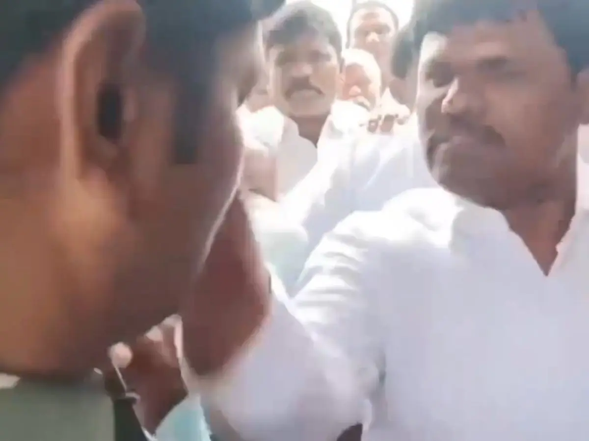 WATCH | Indian Minister's cousin slaps on-duty cop during heated argument, arrested after video goes viral
