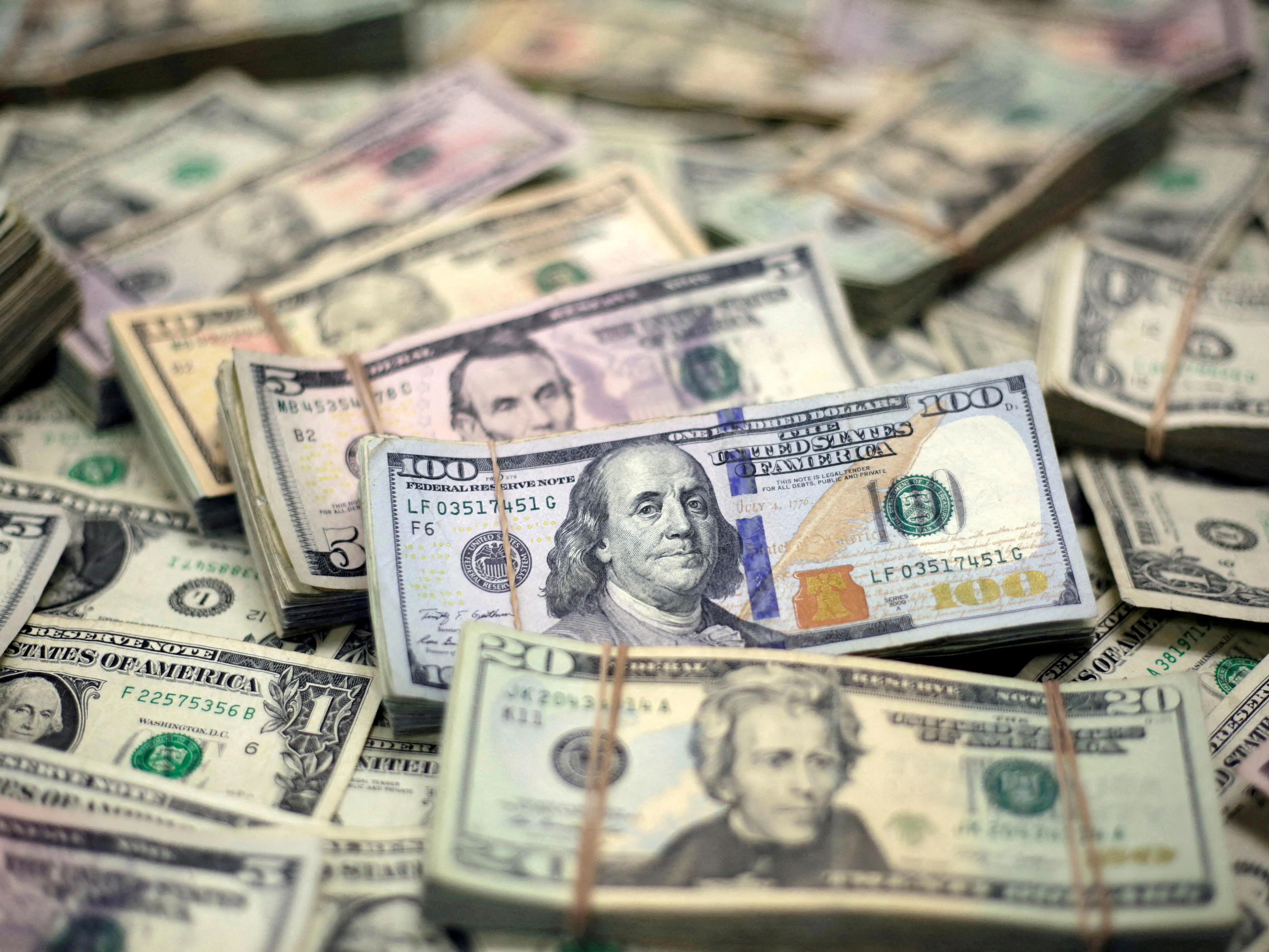 Dollar holds gains on Fed cut bets; RBA decision keeps Aussie in check Dollar holds gains on Fed cut bets; RBA decision keeps Aussie in check