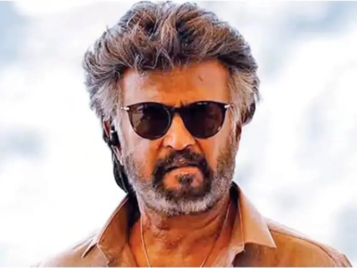Coolie: Rajinikanth fans celebrate by showering flower petals. dance to beating drums | Watch Coolie: Rajinikanth fans celebrate by showering flower petals. dance to beating drums | Watch