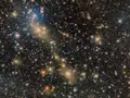 Light-year-long bridge: Stellar merger that started 1 billion years ago has turned into a cosmic robbery