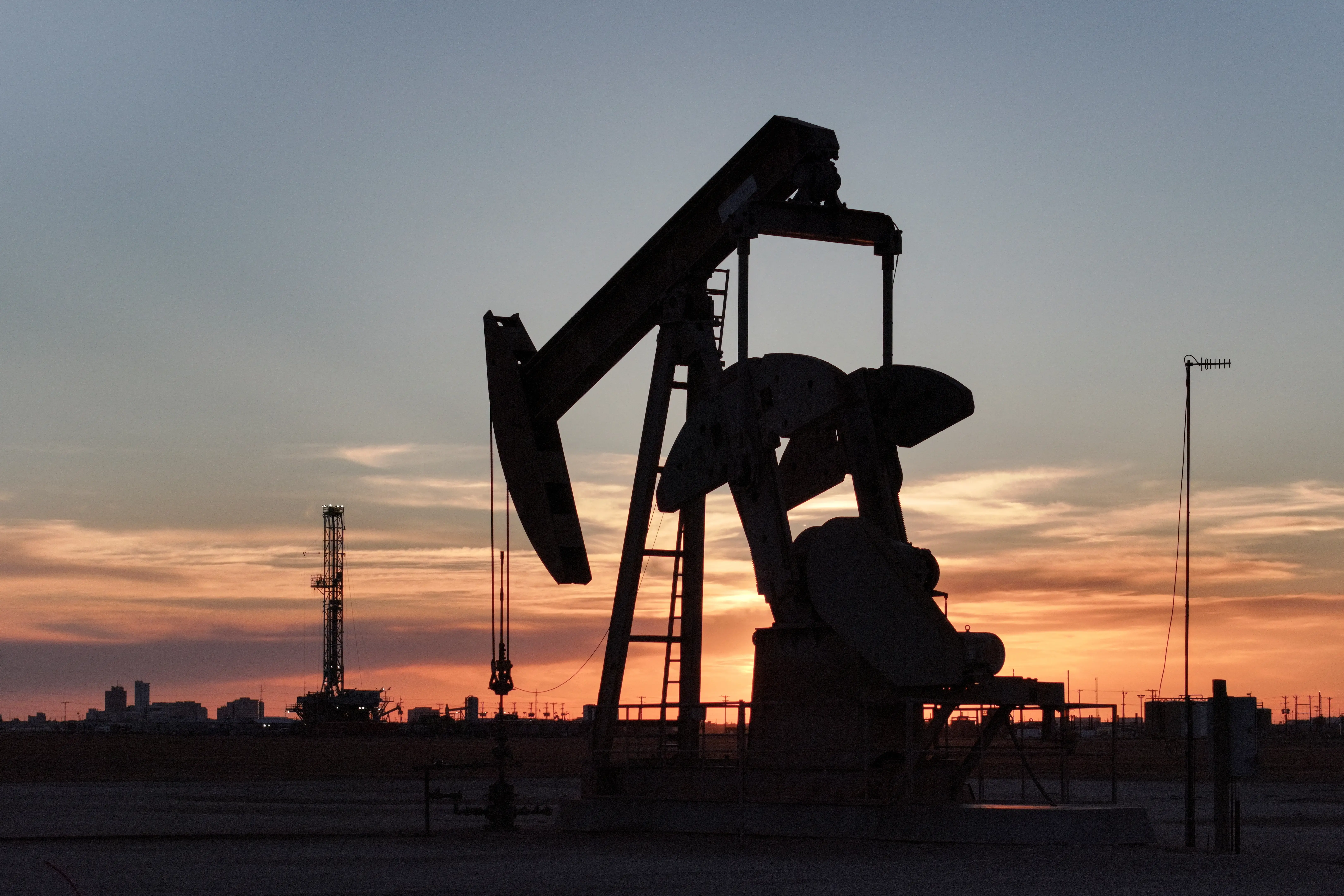 Oil holds steady as Trump-Putin Alaska summit takes centre stage