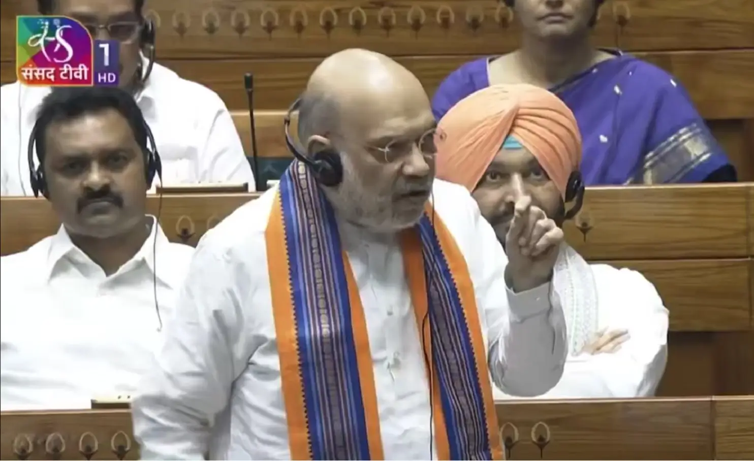 Opposition MPs tear contentious bills, throw paper bits at Amit Shah as he speaks | Watch