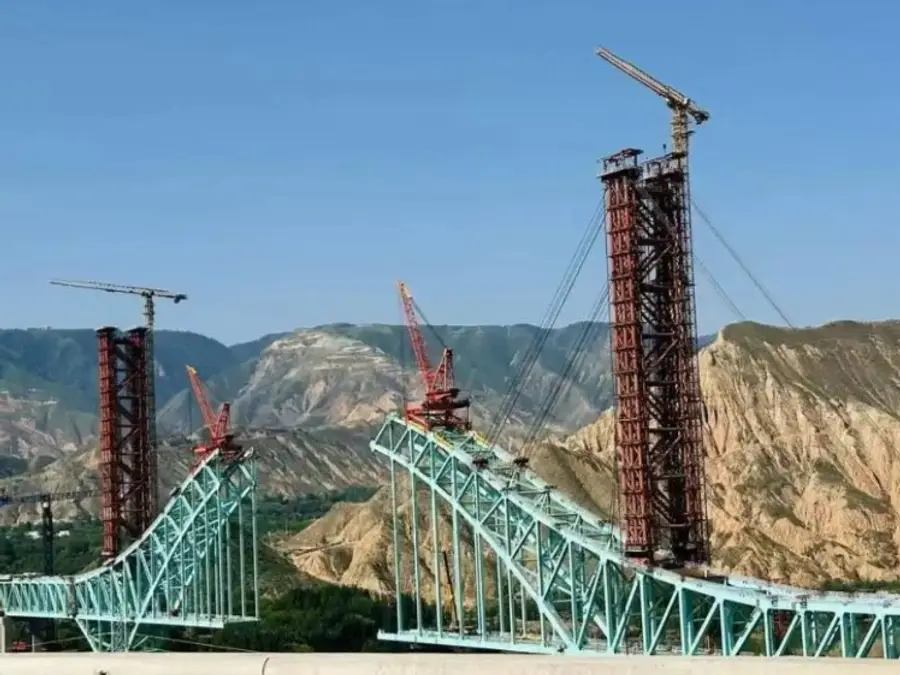 At least 7 dead, 9 missing after rope breaks at under-construction bridge in China