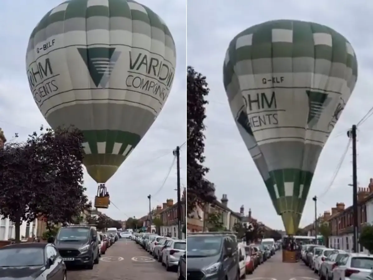 WATCH | Hot air balloon makes ‘near-perfect landing between cars’ in residential street WATCH | Hot air balloon makes ‘near-perfect landing between cars’ in residential street