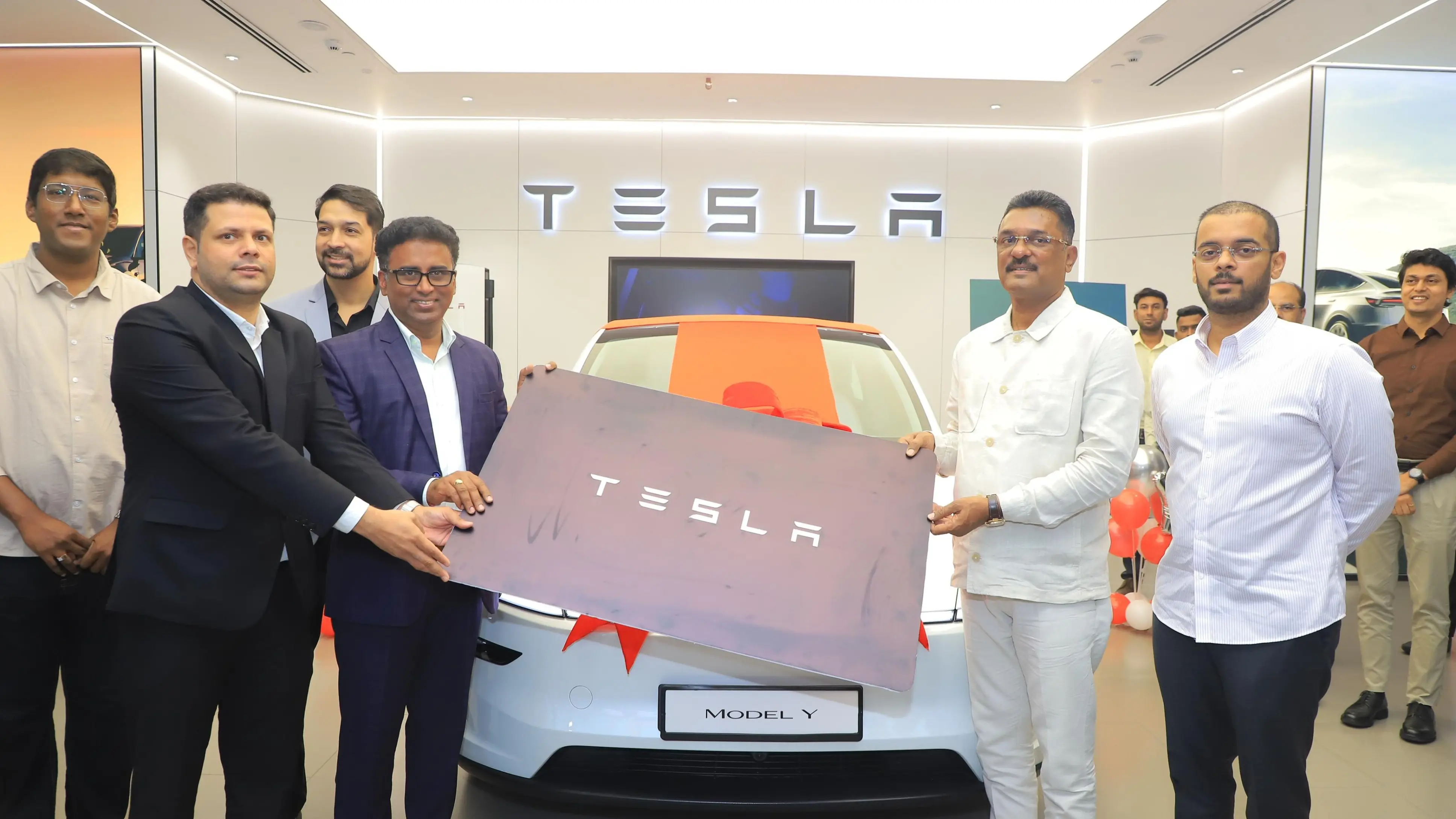 Maharashtra minister becomes first Tesla Model Y owner as first car delivered in India