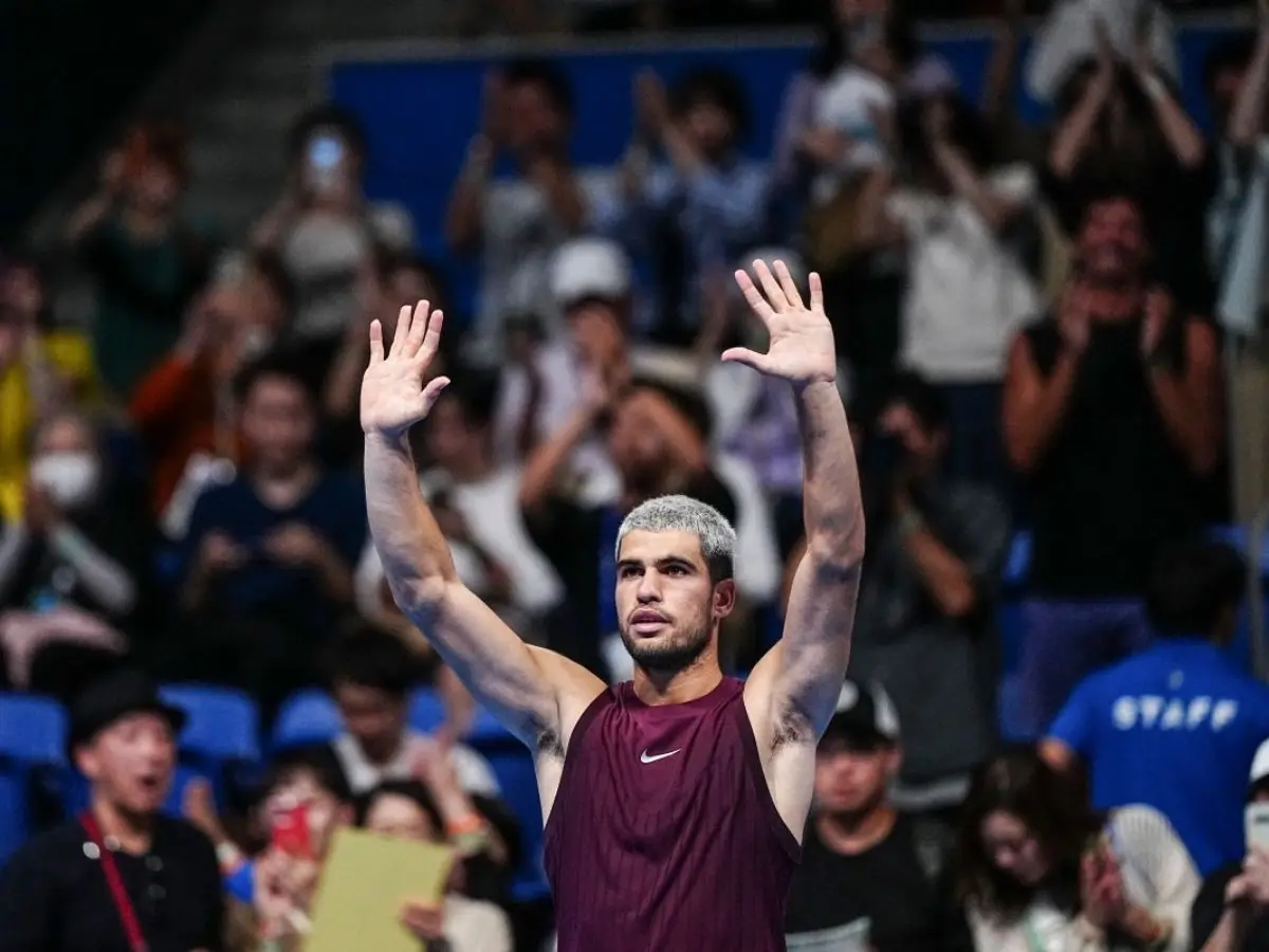 Carlos Alcaraz survives injury scare, rain delay to win Tokyo opener