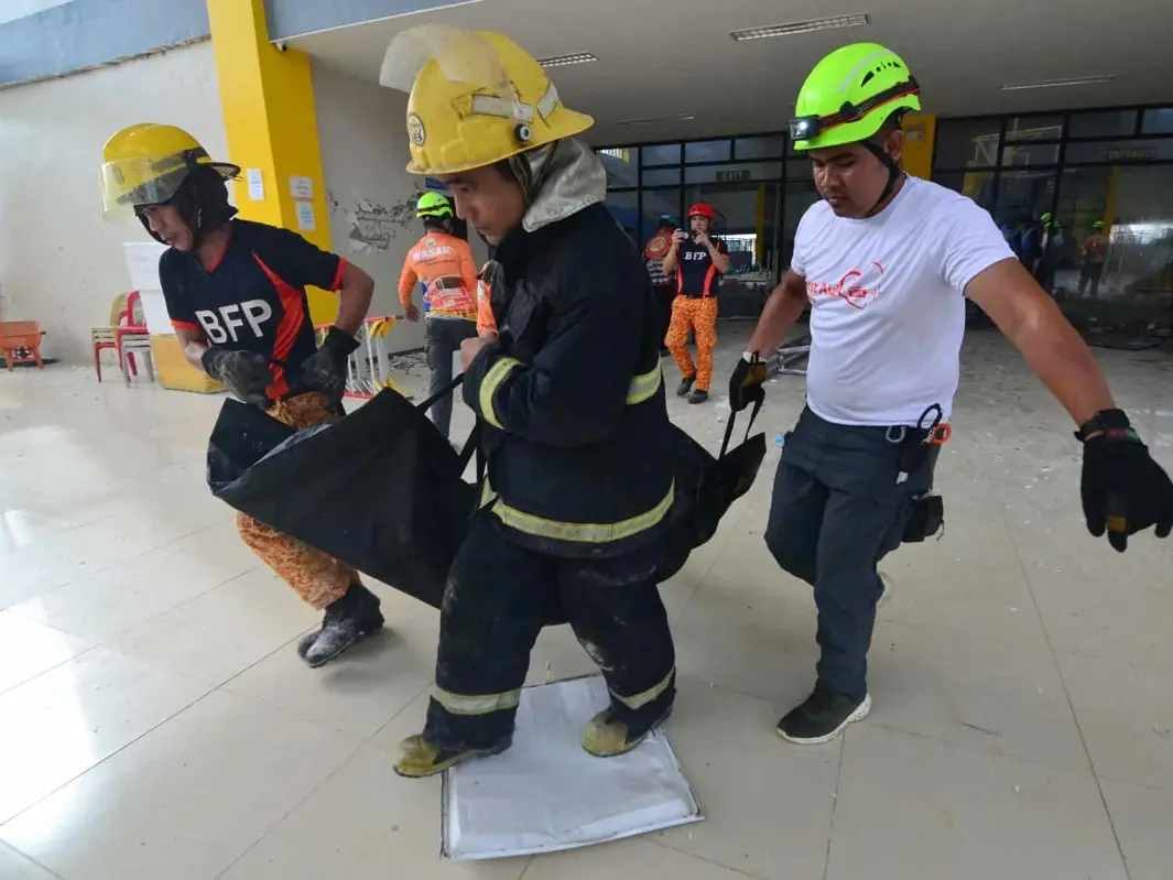 ‘People buried under rubble’: Philippines quake death toll rises to 26, over 147 injured; rescuers search for survivors ‘People buried under rubble’: Philippines quake death toll rises to 26, over 147 injured; rescuers search for survivors