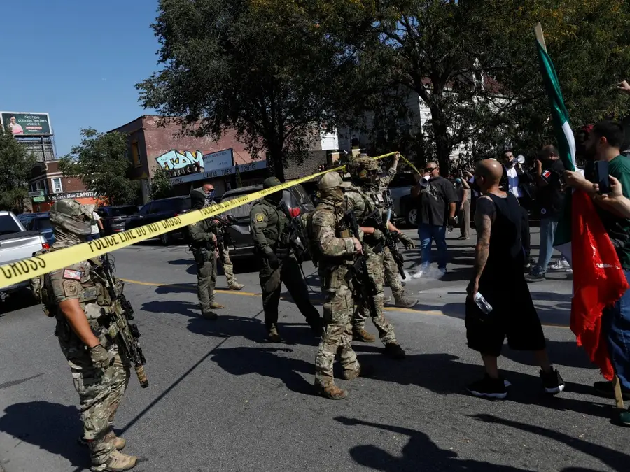 US federal agent shoots woman in Chicago hours after court blocks Trump’s troop order