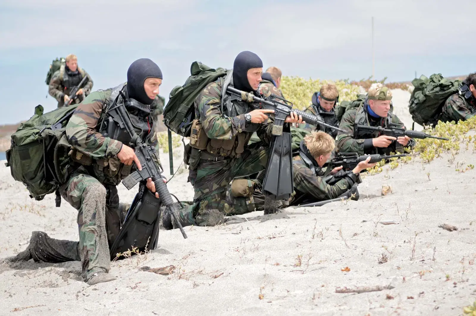 SEALs board the rigs, planting explosives