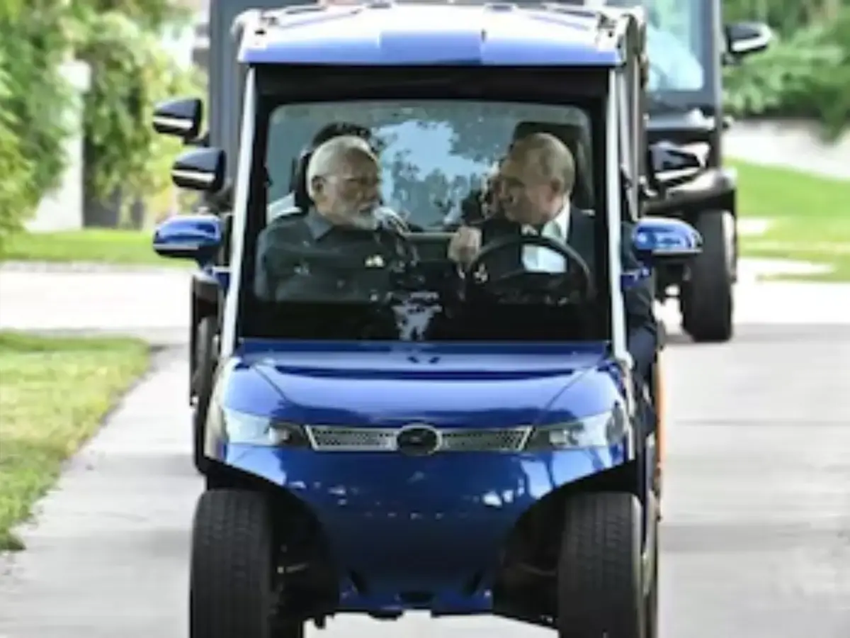 Putin takes driver seat for Modi