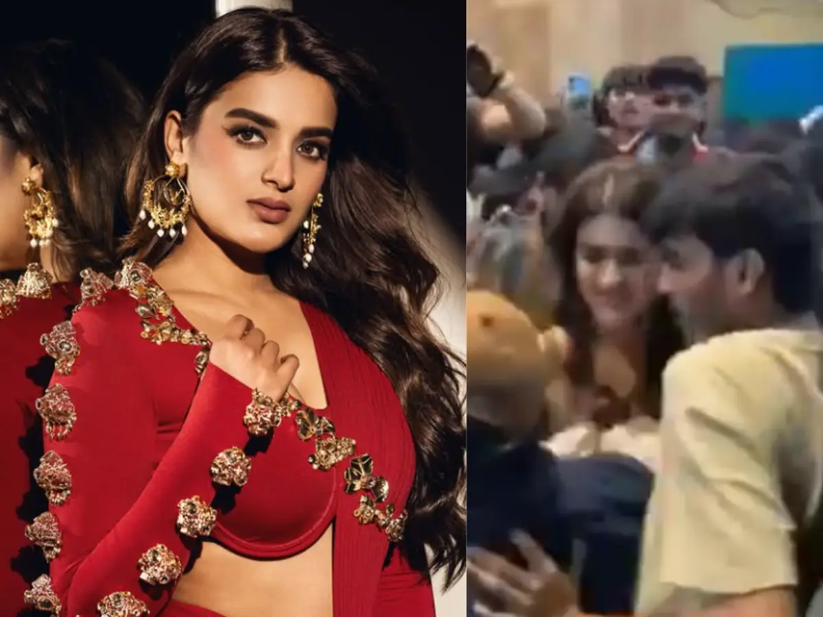 Actress Nidhhi Agerwal mobbed during a song launch at Hyderabad event - WATCH Actress Nidhhi Agerwal mobbed during a song launch at Hyderabad event - WATCH