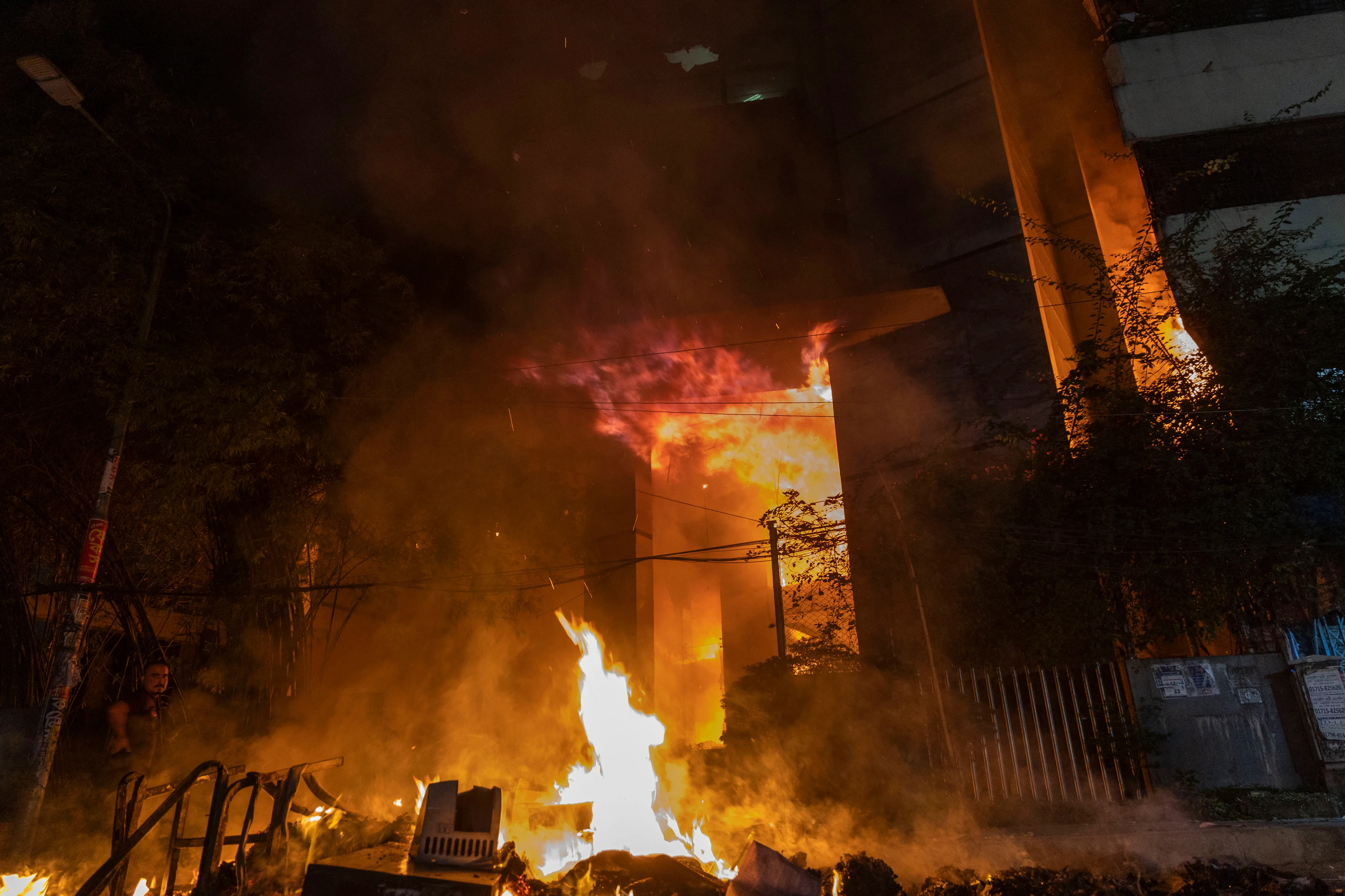 In Pics | How death of radical youth leader Sharif Osman Hadi sparked violence in Bangladesh