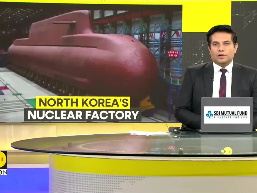 Kim Jong Un visits nuclear submarine factory