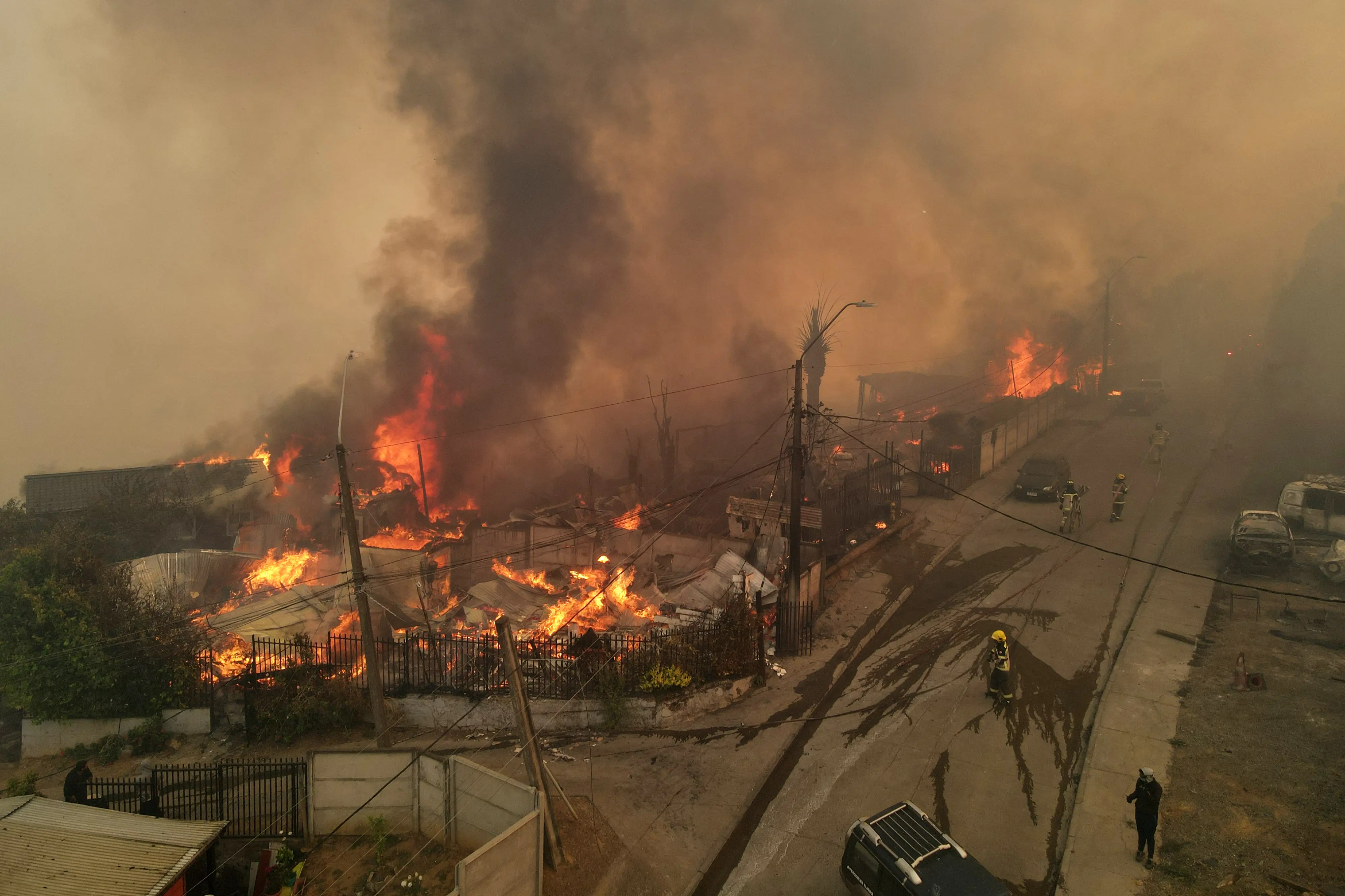 Firefighters battle blaze in bad weather