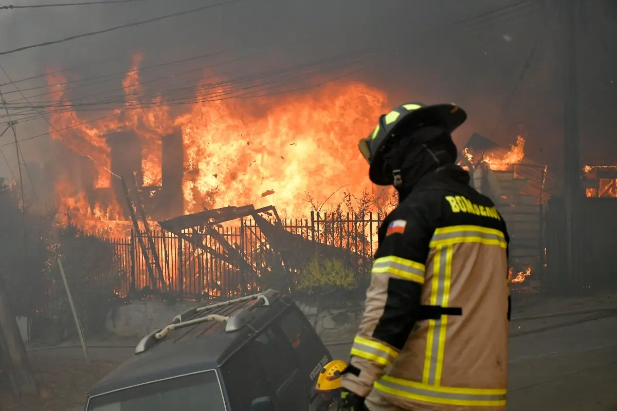 In Pics | Wildfires ravage through southern Chile, charring houses and cars