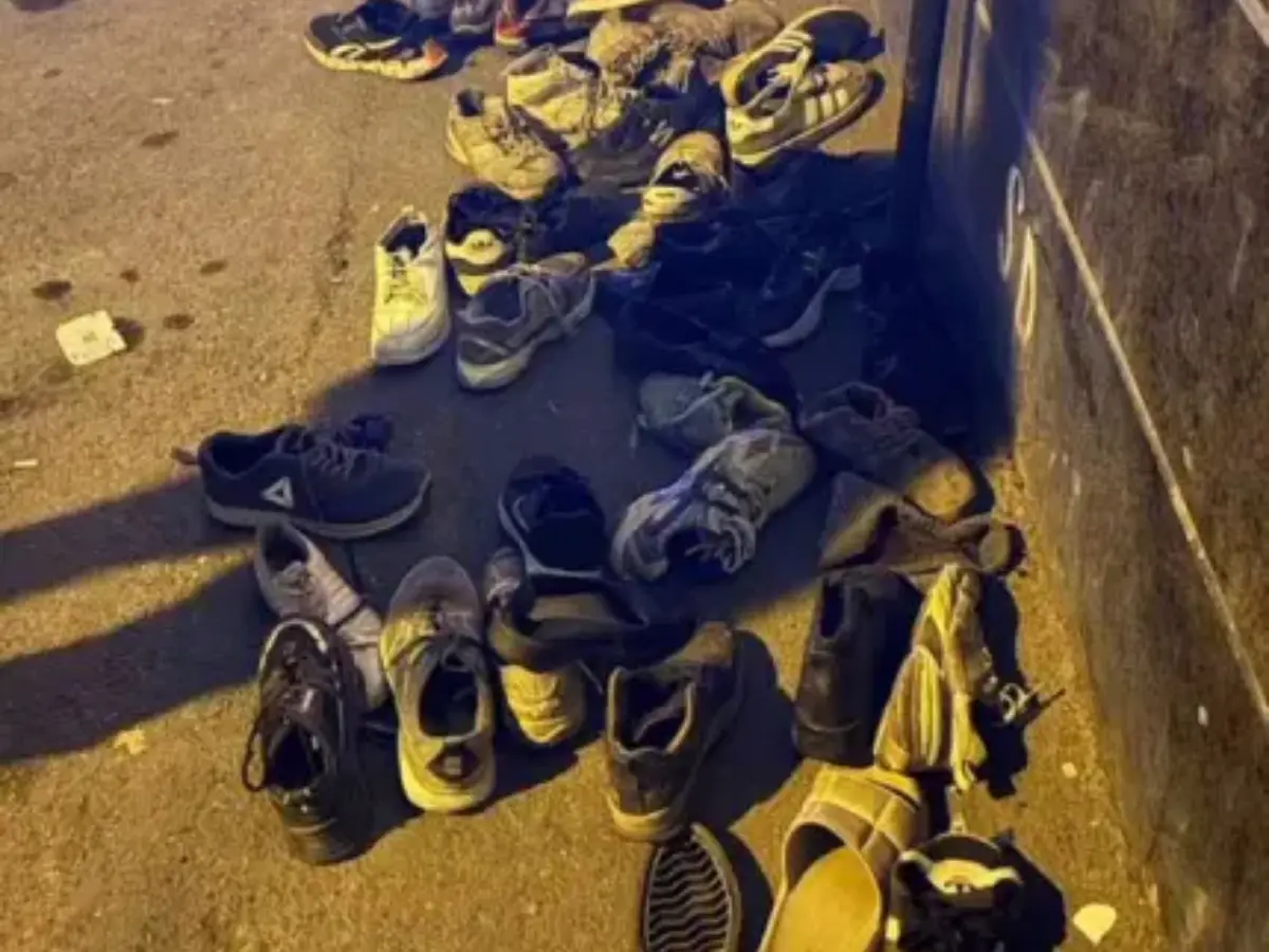 Chilling image shows pile of shoes outside historic Iranian bazaar where protesters were burned alive