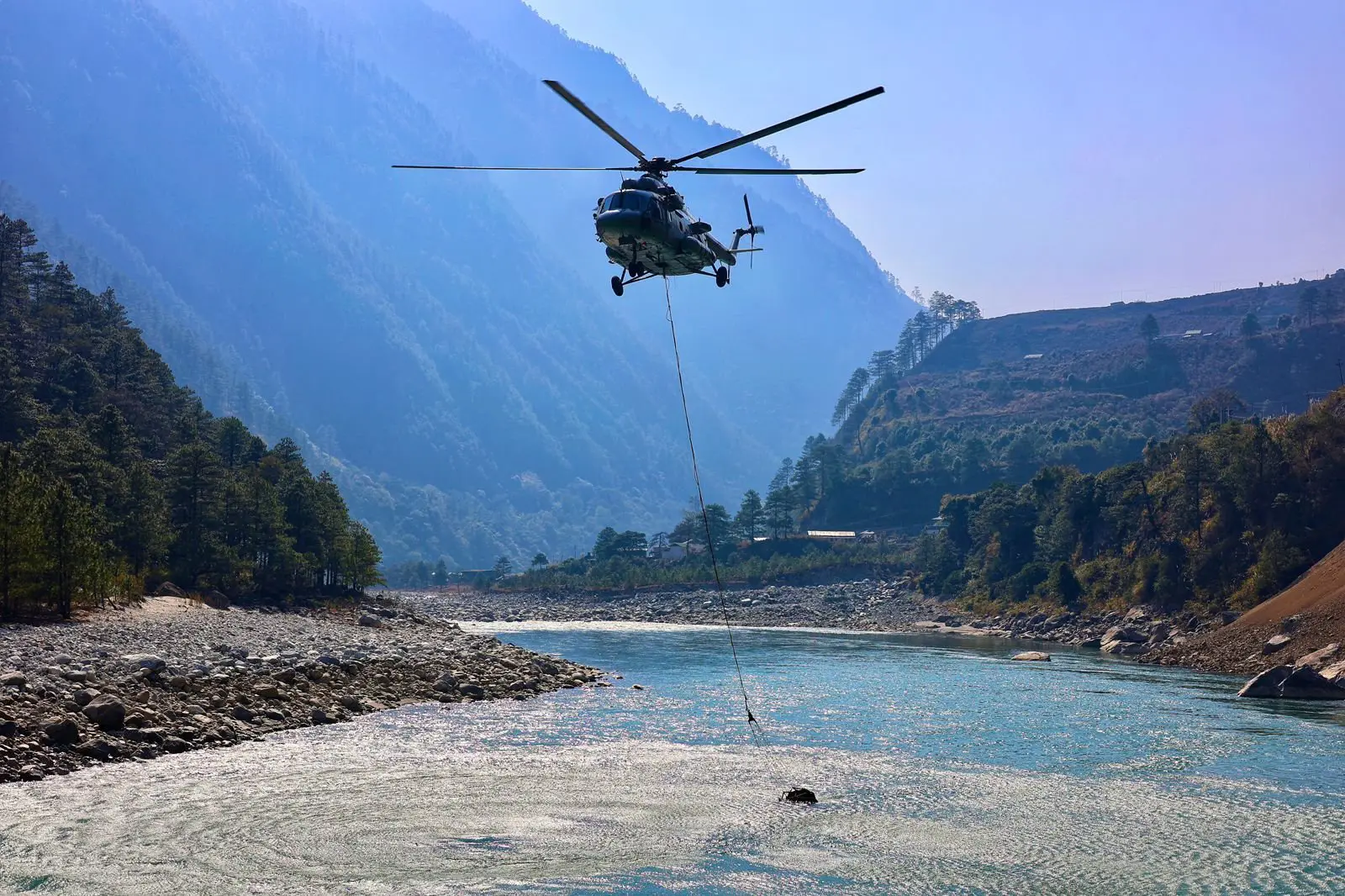 Indian Air Force's Mi-17V5 helicopters dropped 12,000 litres of water in the rarefied Himalayan air