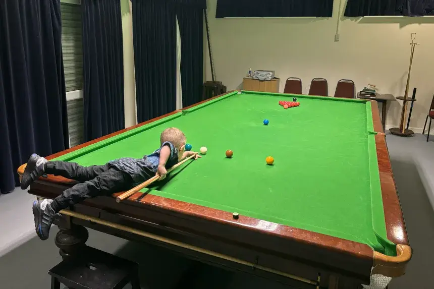 2-year-old England boy sets two Guinness world records with AMAZING snooker trick shots