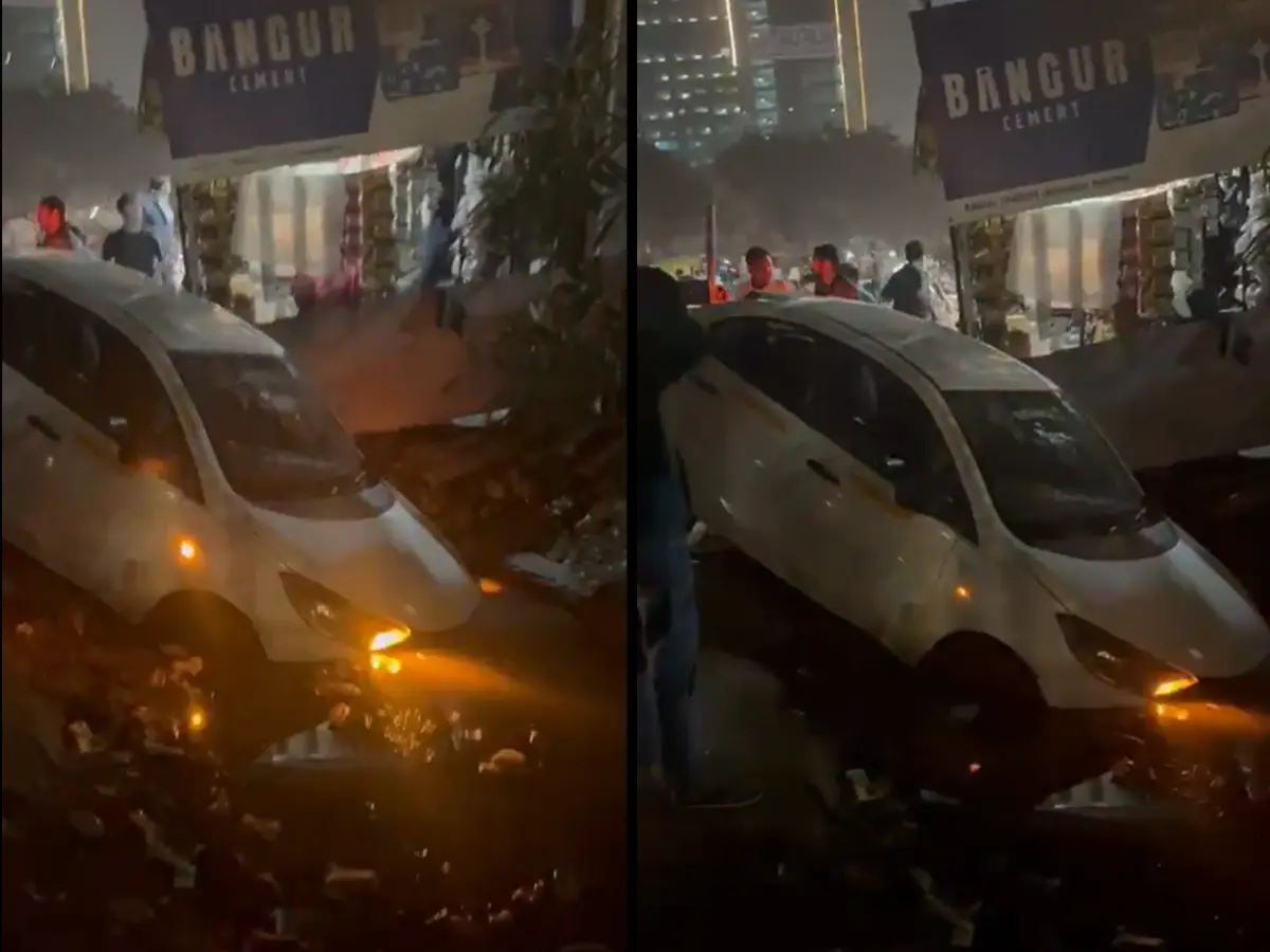 Days after Noida techie's death, car falls into open drain in Sector 70; residents accuse authorities of negligence | Watch Days after Noida techie's death, car falls into open drain in Sector 70; residents accuse authorities of negligence | Watch