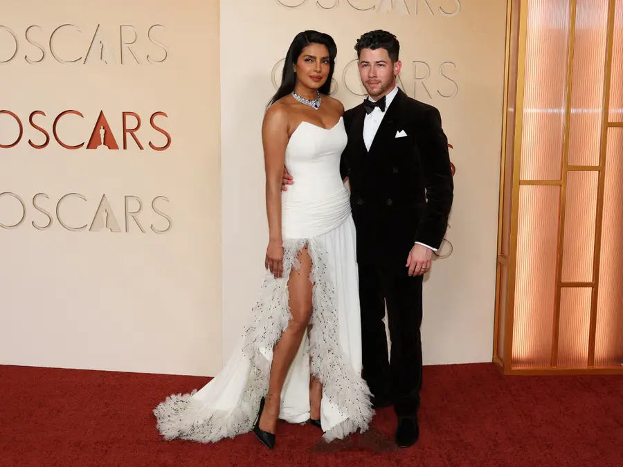 Priyanka Chopra stuns in white Dior dress for Oscar's night as she steps out with husband Nick Jonas