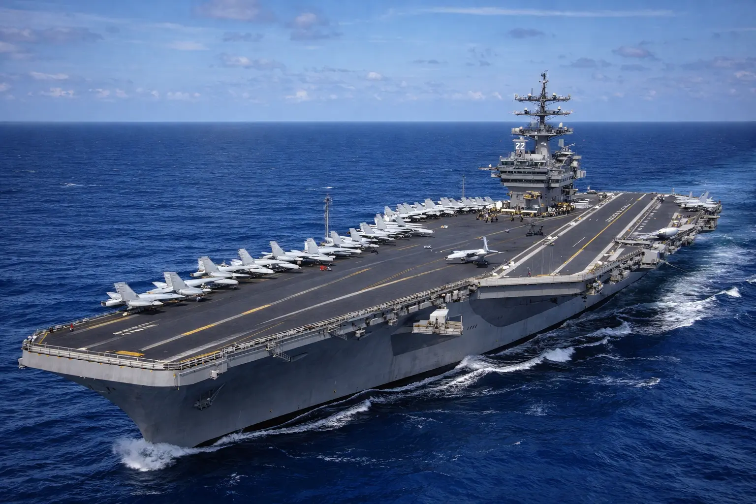 How is landing a fighter jet on USS Abraham Lincoln different from USS Tripoli?