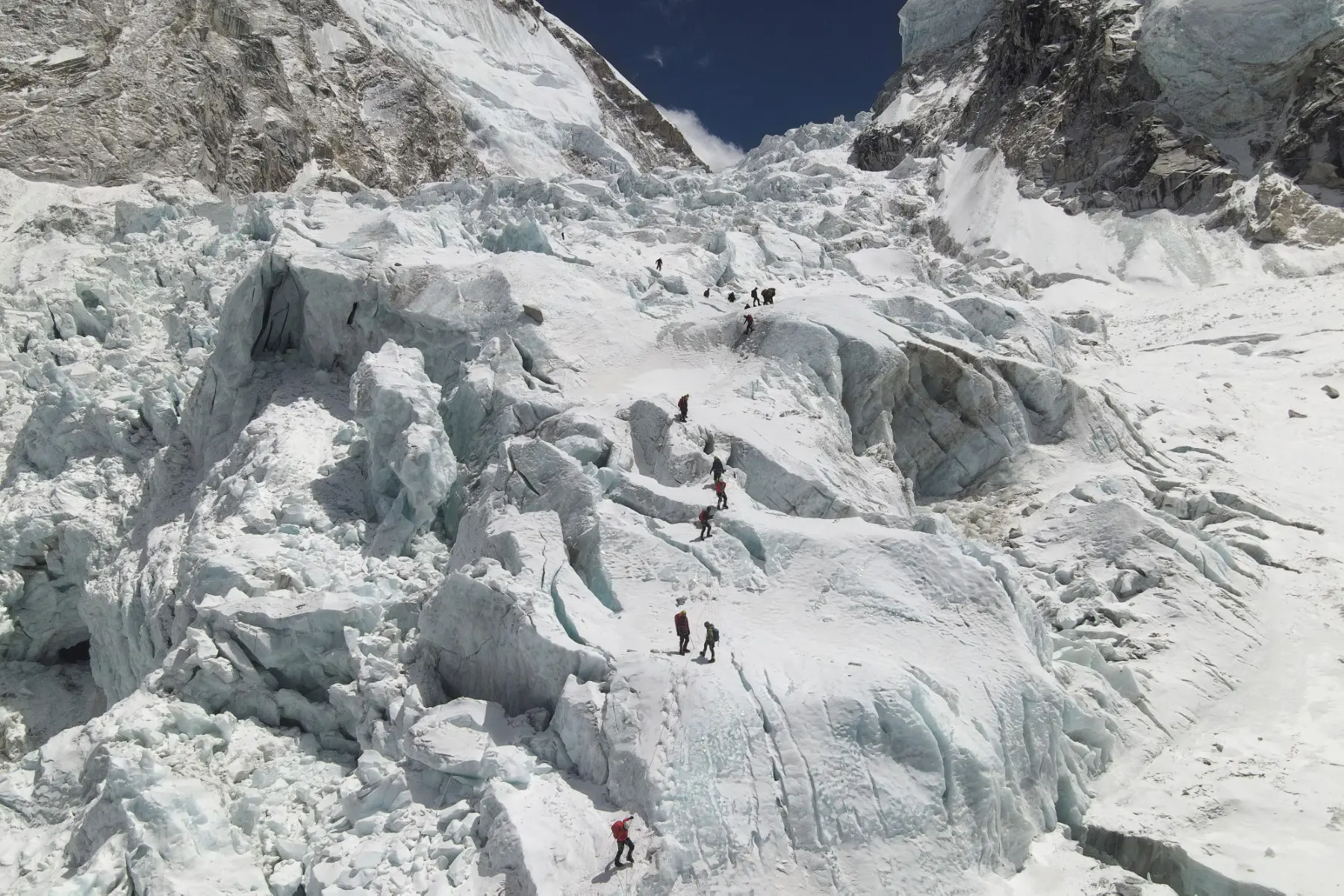 Frozen threat above as 400+ climbers remain stuck in Everest base camp