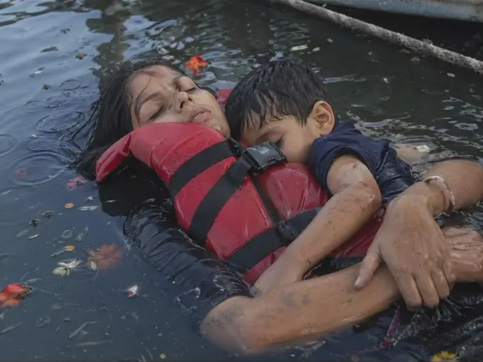 Bargi Dam cruise boat tragedy: Heartbreaking photo of mother and son clinging to each other fake? Jabalpur collector says... Bargi Dam cruise boat tragedy: Heartbreaking photo of mother and son clinging to each other fake? Jabalpur collector says...