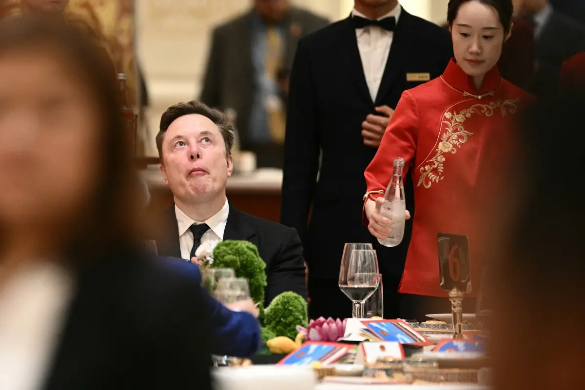 Elon Musk goes viral for spinning and filming like a tourist during Trump’s China visit