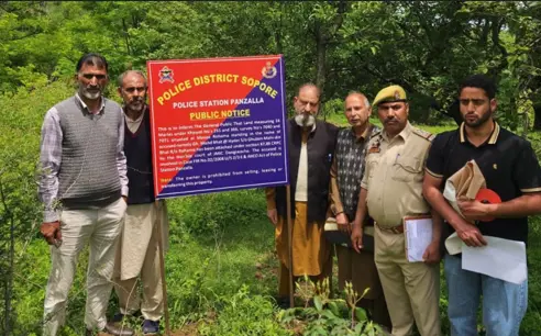 Sopore Police attach property of proclaimed offender linked to Hizbul Mujahideen network