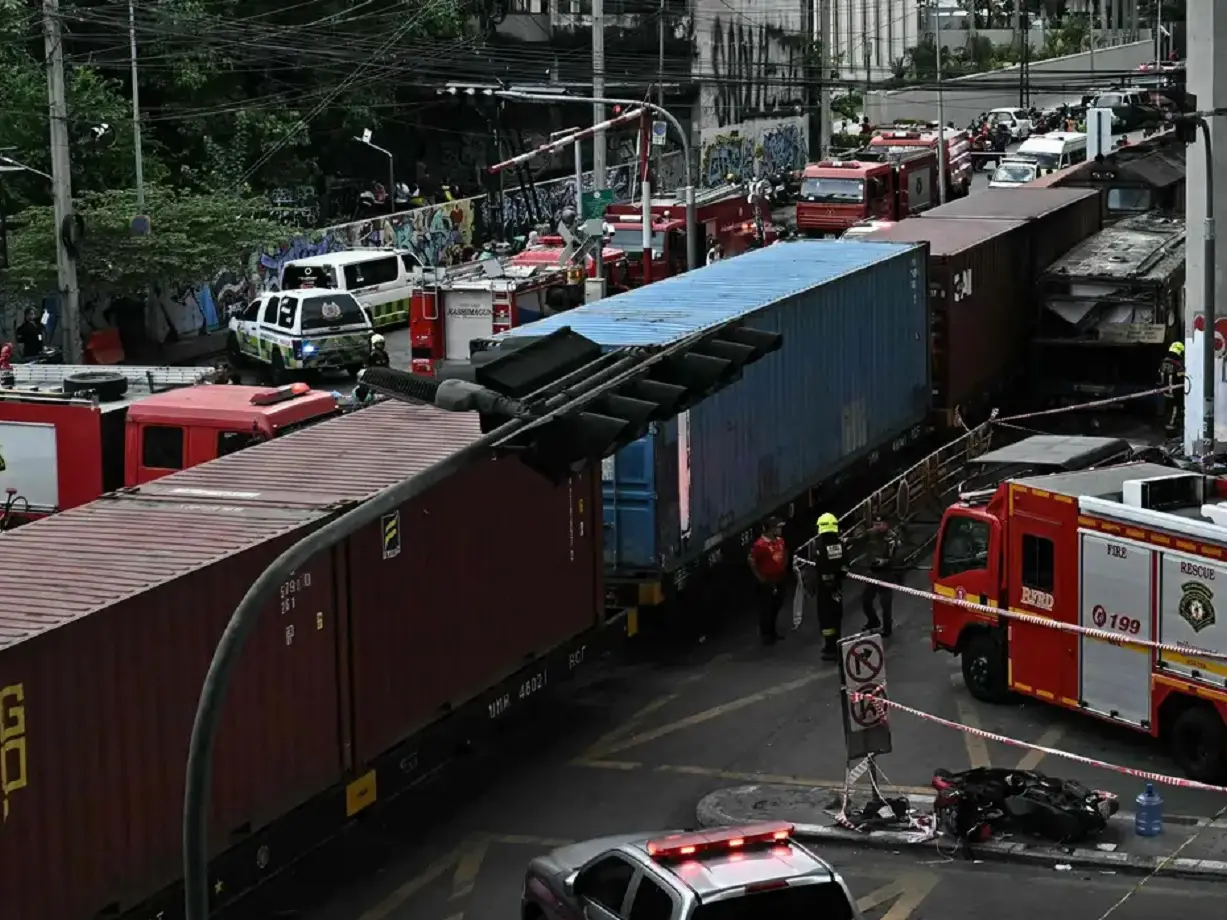 Eight killed, 32 injured as freight train hits bus at rail crossing in Bangkok Eight killed, 32 injured as freight train hits bus at rail crossing in Bangkok