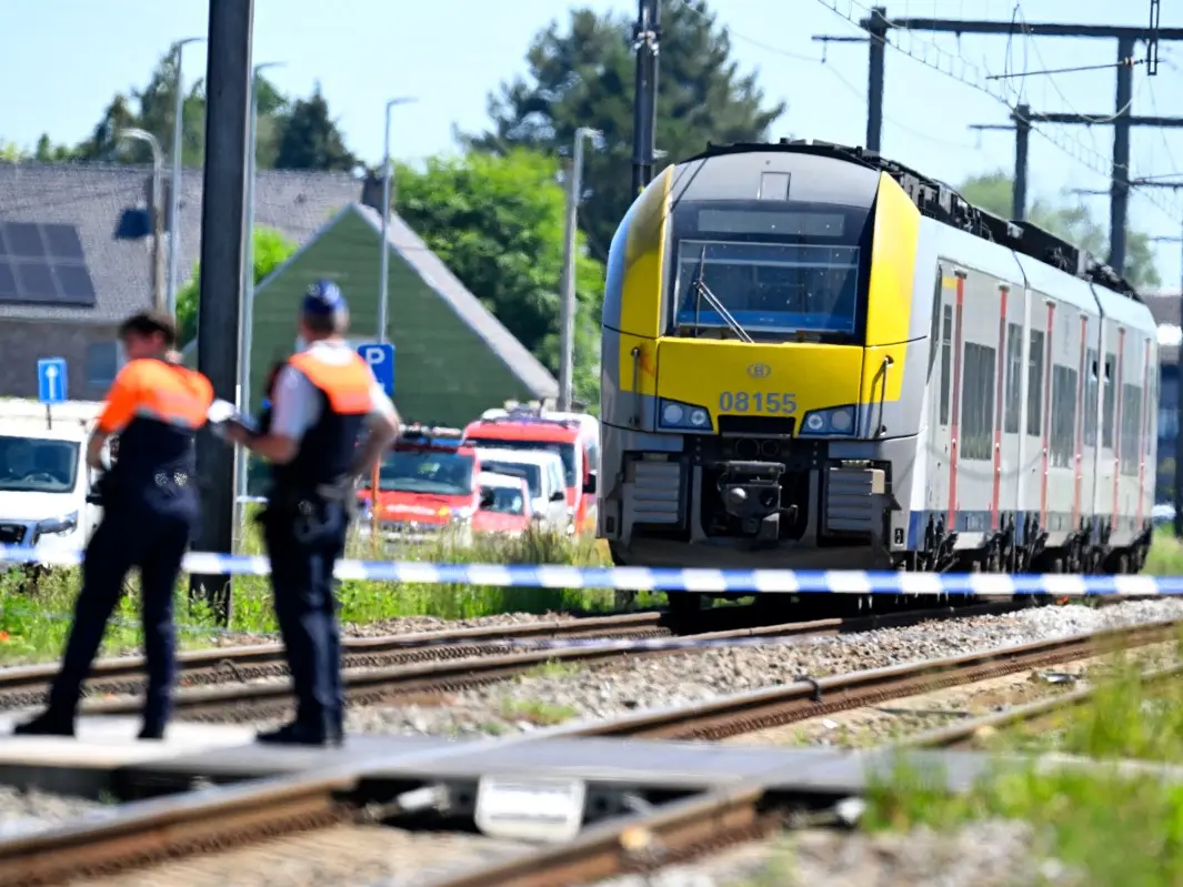 Four killed, including children, after train hits school bus in Belgium Four killed, including children, after train hits school bus in Belgium