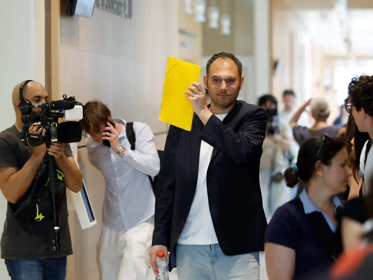 Paris school aide goes on trial for alleged sexual assault of kindergarteners
