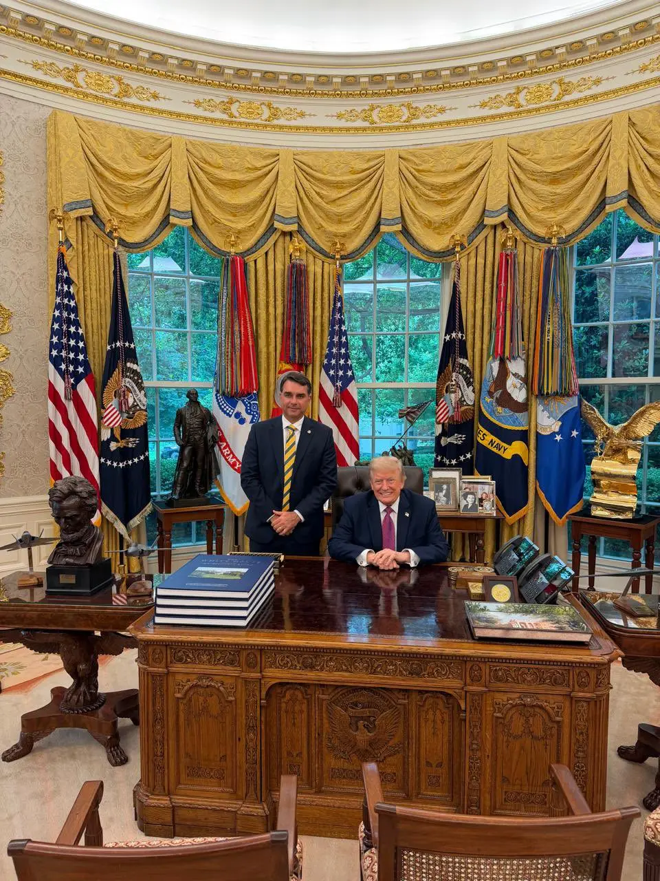 Flavio Bolsonaro meets Donald Trump amid bank fraud scandal and Brazil election race